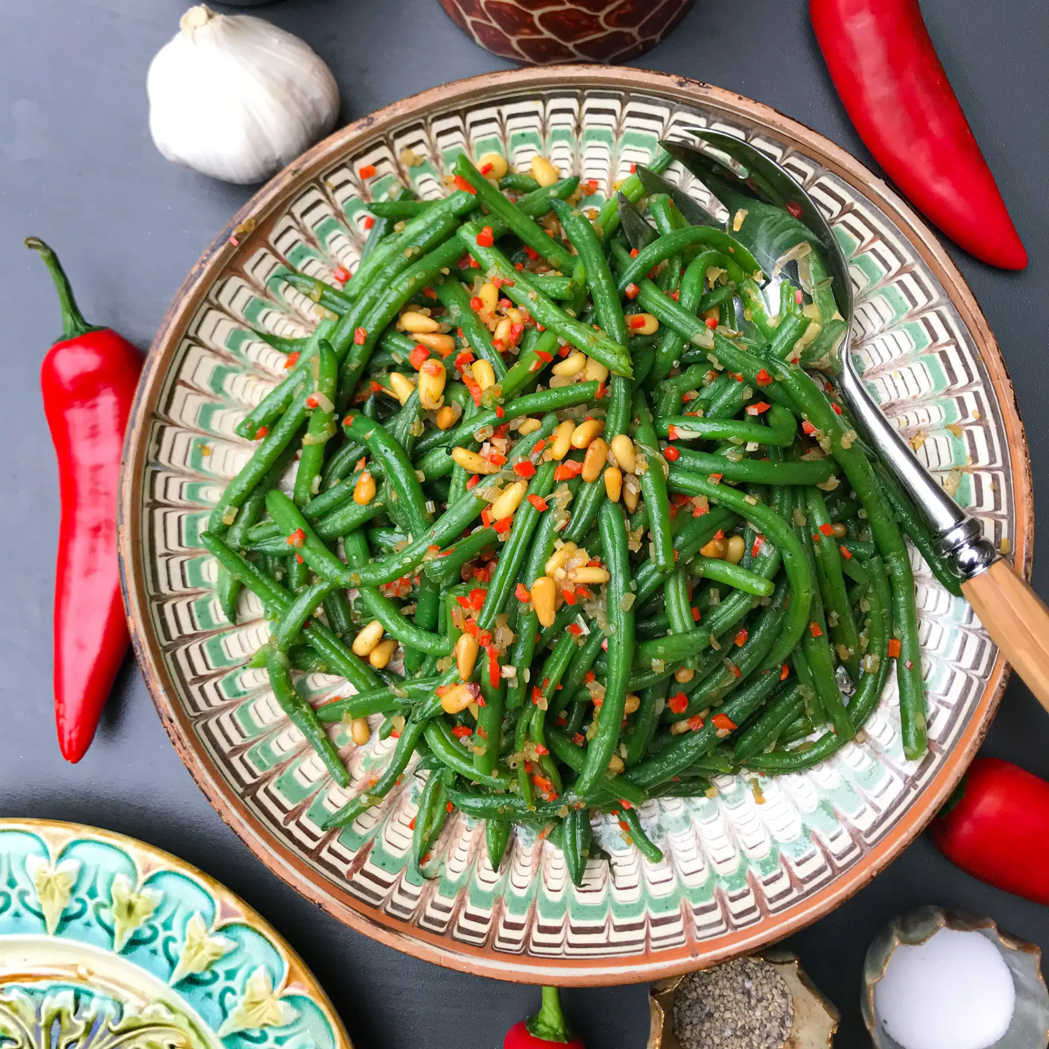 Green beans, pine nuts and chilli