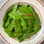 Snow peas with crushed fennel seed