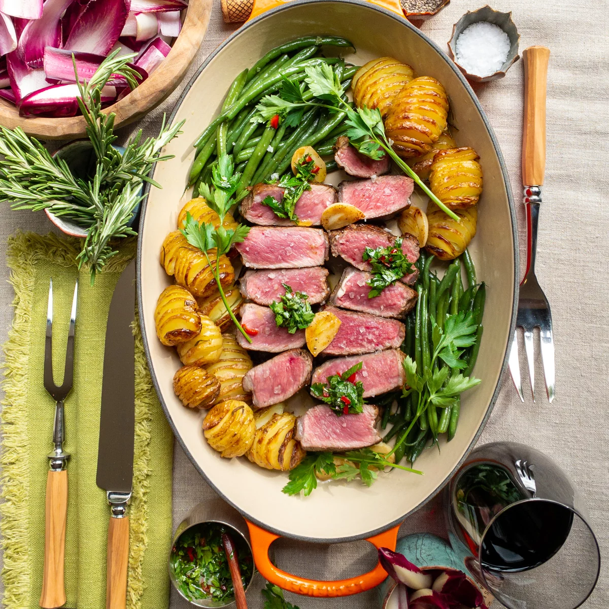 Veal sirloin steak with hasselback potatoes and chimichurri