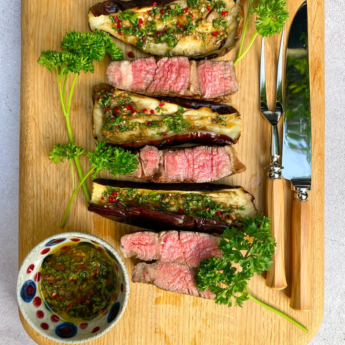 Grilled ribeye steak with chimichurri