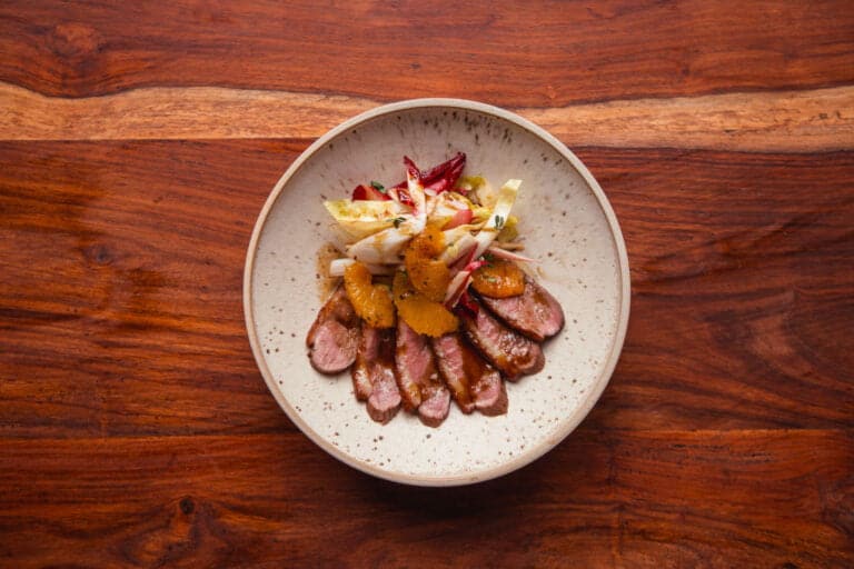 sticky Duck salad with orange and chicory