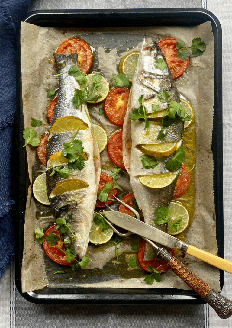 Slow roasted Sea bass with tomato and lime