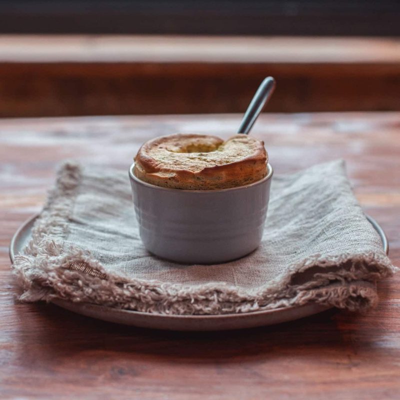 Pistachio soufflé with mango sorbet